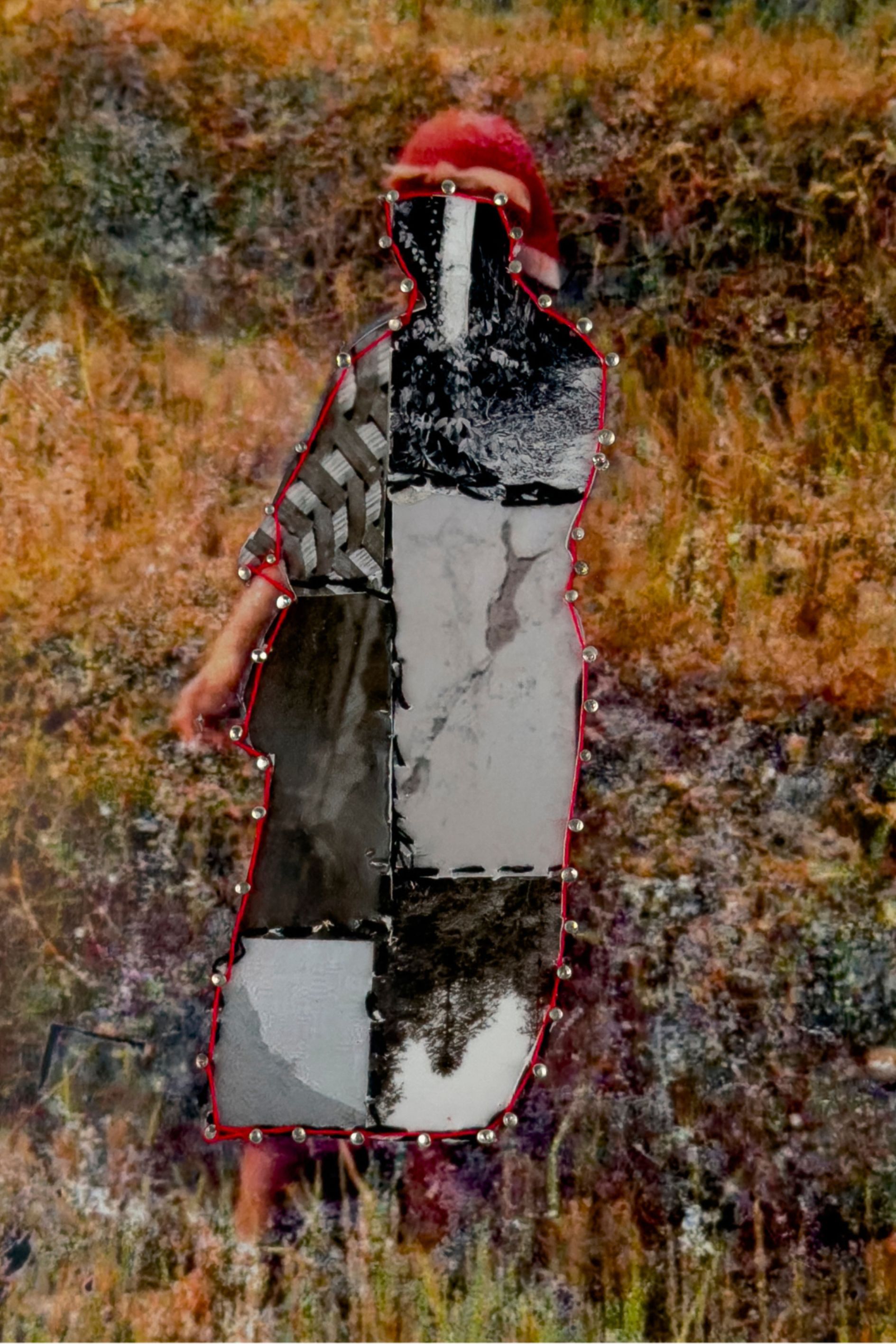 An altered photograph of a woman in the landscape